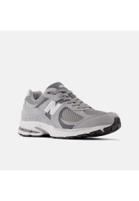 Sneakersy unisex New Balance M2002RST Szary. Kolor: szary. Materiał: guma, syntetyk, skóra, materiał. Szerokość cholewki: normalna. Sport: turystyka piesza