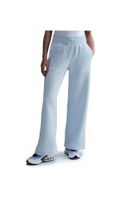 Spodnie damskie Nike Sportswear Phoenix Polar DQ5615-423 - niebieskie. Kolor: niebieski. Materiał: polar. Sport: fitness