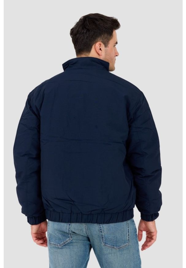 Tommy Jeans - TOMMY JEANS Granatowa męska kurtka przejściowa z drobnym logo, Rozmiar M. Kolor: niebieski. Materiał: poliamid. Wzór: bez wzorów