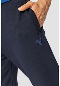Guess - GUESS Granatowe męskie spodnie Aldwin, Rozmiar XL. Kolor: niebieski. Materiał: materiał, bawełna, poliester #5