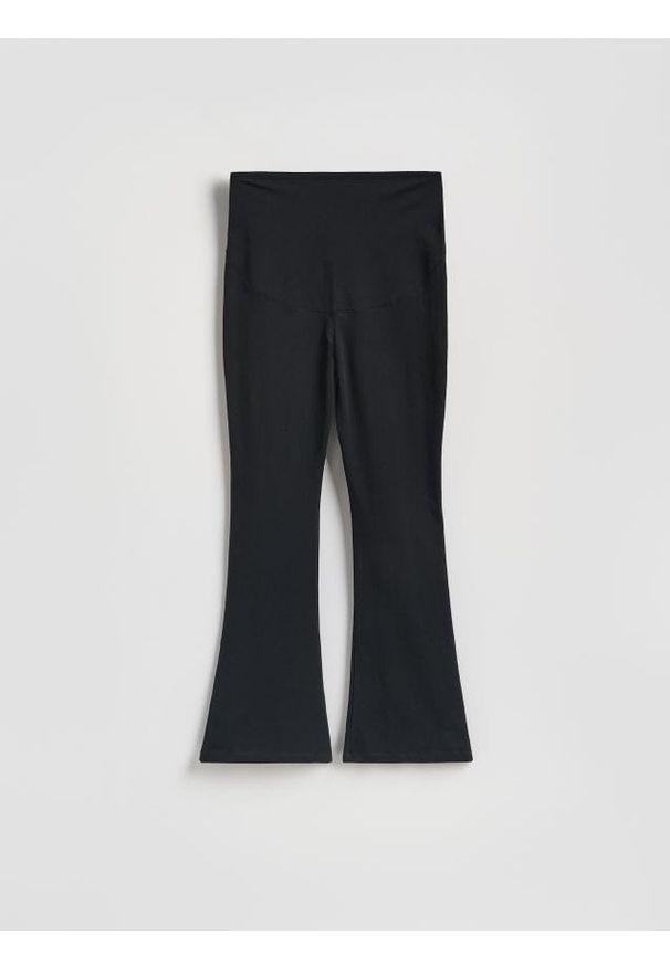 Reserved - Legginsy flare - czarny. Kolor: czarny. Materiał: dzianina, bawełna