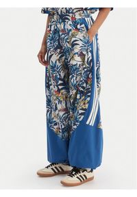 Adidas - adidas Spodnie dresowe Farm Rio Premium KD4643 Niebieski Loose Fit. Kolor: niebieski. Materiał: syntetyk #1