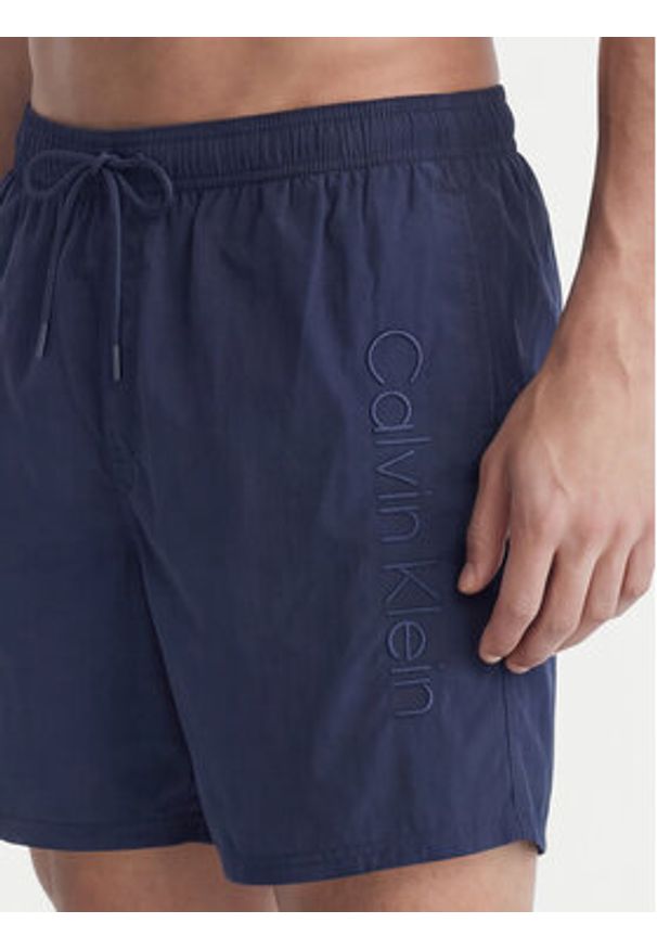Calvin Klein Swimwear Szorty kąpielowe LV00N61029 Granatowy Regular Fit. Kolor: niebieski. Materiał: syntetyk