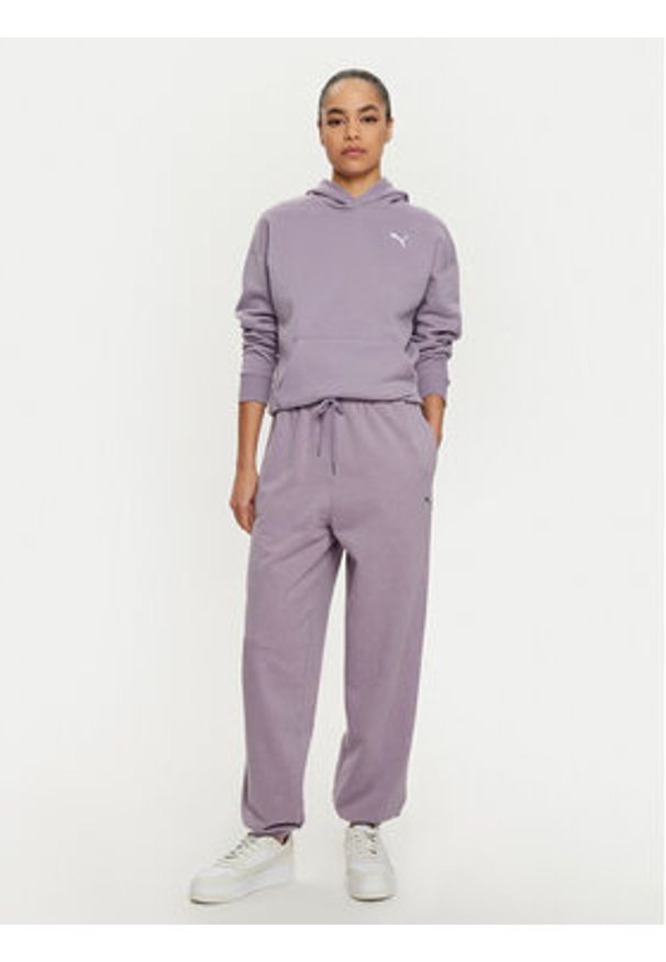 Puma Spodnie dresowe Dare To 626802 Fioletowy Relaxed Fit. Kolor: fioletowy. Materiał: bawełna