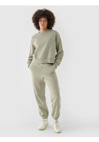 4f - 4F Spodnie dresowe joggery oversize damskie - oliwkowe XXL. Kolor: oliwkowy, brązowy, wielokolorowy. Materiał: dresówka. Wzór: gładki, ze splotem