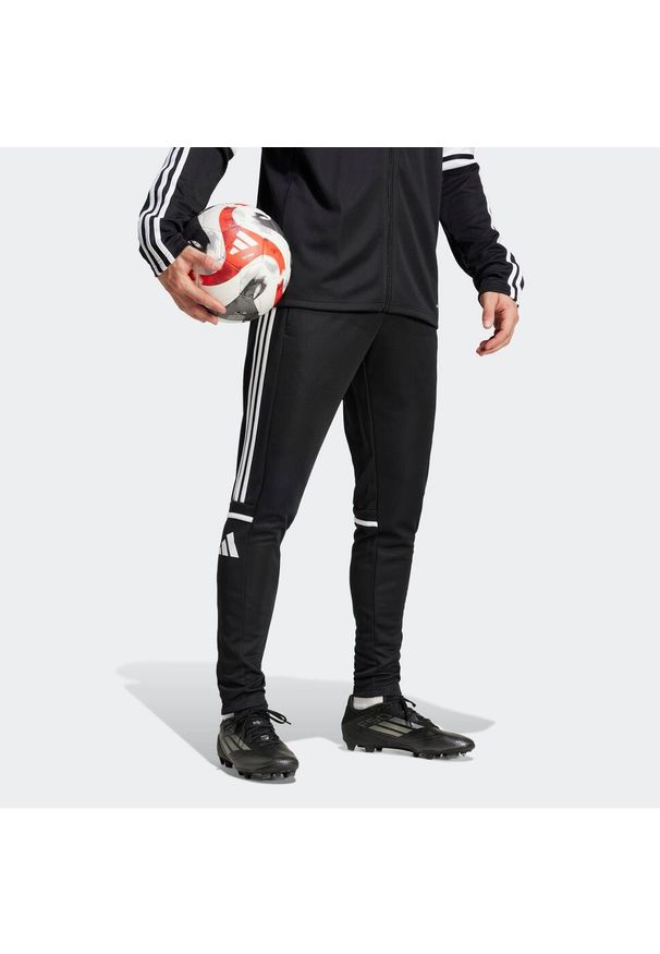 Adidas - Spodnie piłkarskie ADIDAS Squadra 25 treningowe. Kolor: czarny, wielokolorowy, biały. Sport: piłka nożna