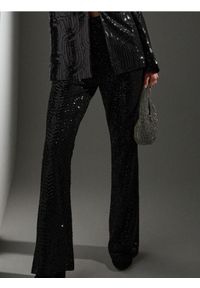 Sinsay - Spodnie dzwony z połyskującymi cekinami - czarny. Kolor: czarny #1