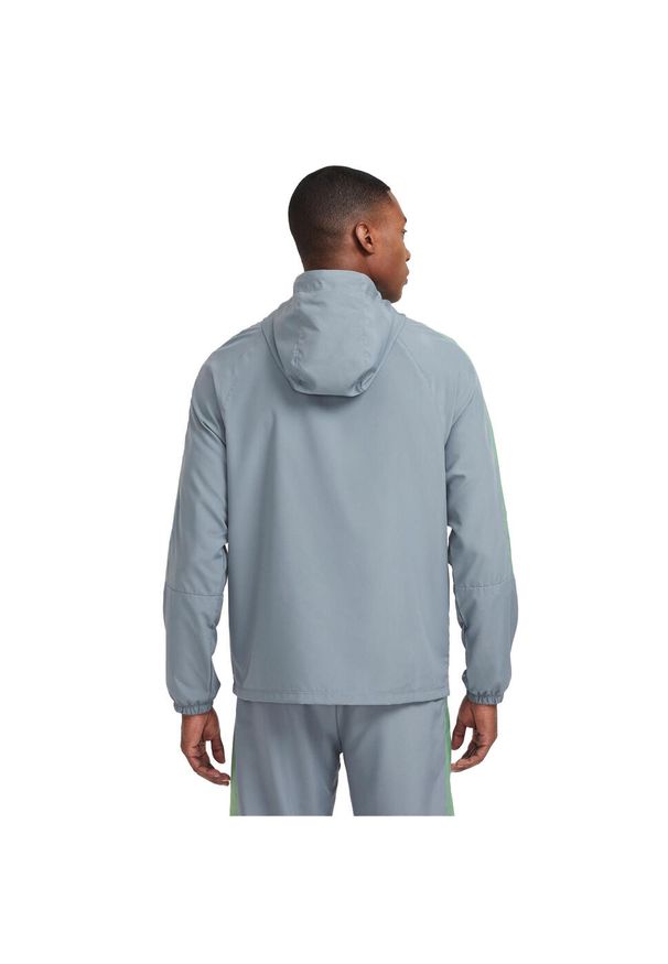 Nike - Męska Wodoodporna Kurtka Academy Z Kapturem. Typ kołnierza: kaptur. Kolor: szary. Sport: turystyka piesza