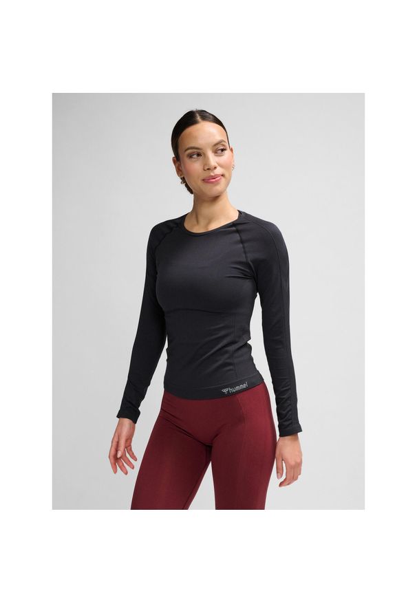 Damska koszulka z długim rękawem Hummel Clea. Kolor: czarny. Materiał: dzianina. Długość rękawa: długi rękaw. Długość: długie. Wzór: jodełka. Sport: piłka ręczna