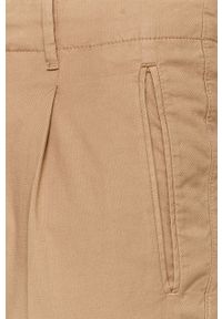 TOMMY HILFIGER - Tommy Hilfiger - Spodnie. Kolor: beżowy. Materiał: tkanina. Wzór: gładki #2