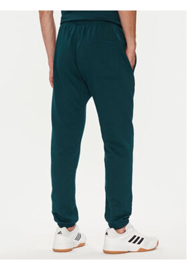 Adidas - adidas Spodnie dresowe ALL SZN Fleece JX5096 Zielony Tapered Leg. Kolor: zielony. Materiał: bawełna