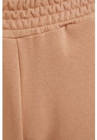 Answear Lab spodnie dresowe damskie kolor beżowy gładkie. Kolor: beżowy. Materiał: dresówka. Wzór: gładki #4