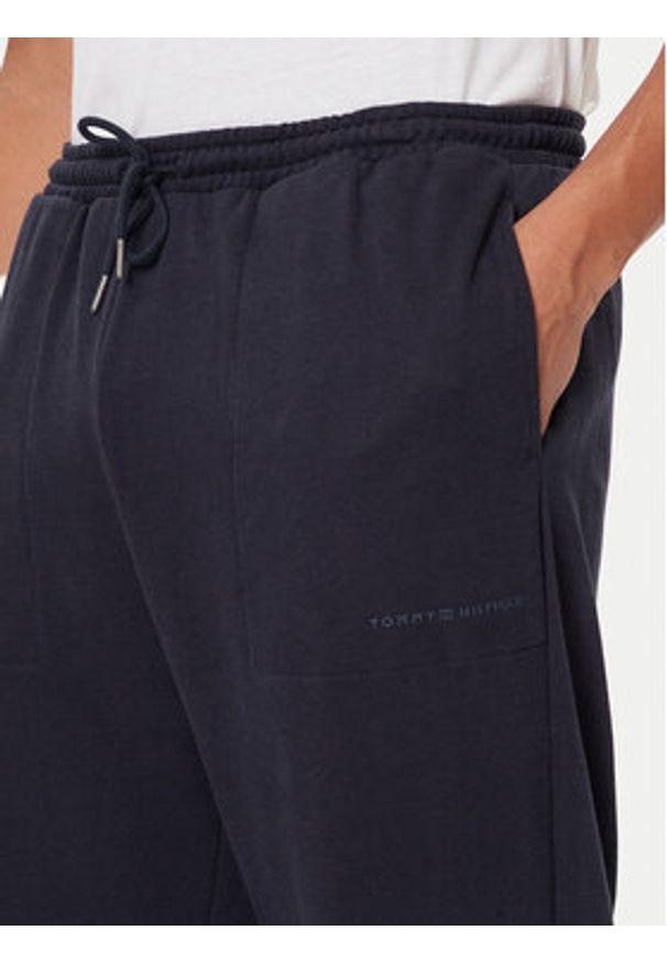 TOMMY HILFIGER - Tommy Hilfiger Spodnie dresowe UM0UM03627 Niebieski Regular Fit. Kolor: niebieski. Materiał: bawełna