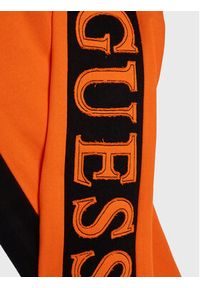 Guess Spodnie dresowe N3RQ12 KA6R3 Pomarańczowy Regular Fit. Kolor: pomarańczowy. Materiał: bawełna #2