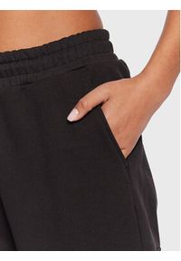 Calvin Klein Jeans Spodnie dresowe J20J220262 Czarny Relaxed Fit. Kolor: czarny. Materiał: bawełna, dresówka #4