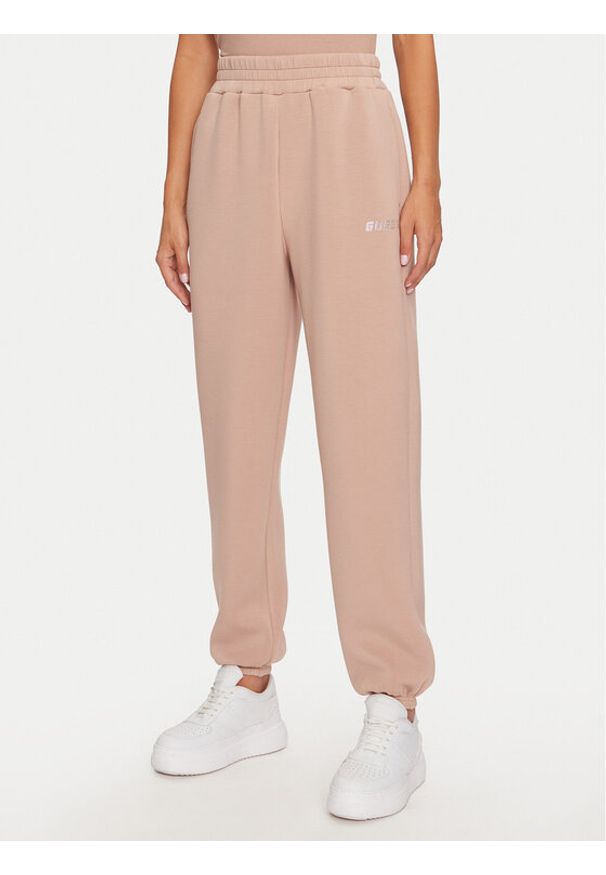 Guess Spodnie dresowe Cecilia V4BB13 K7UW2 Beżowy Regular Fit. Kolor: beżowy. Materiał: wiskoza