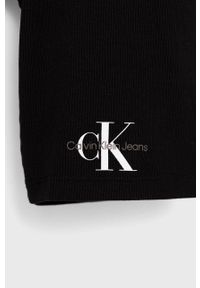 Calvin Klein Jeans szorty dziecięce kolor czarny z nadrukiem. Kolor: czarny. Materiał: dzianina. Wzór: nadruk