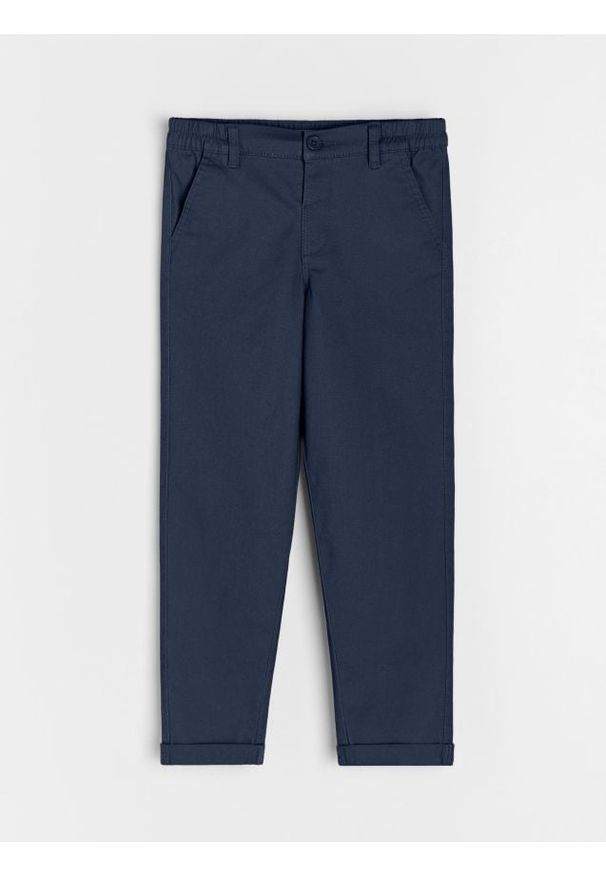 Sinsay - Spodnie typu chinos z elastycznym pasem - granatowy. Kolor: niebieski