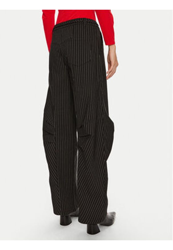 ROTATE Spodnie materiałowe Cassandria 1131372470 Czarny Loose Fit. Kolor: czarny. Materiał: wiskoza