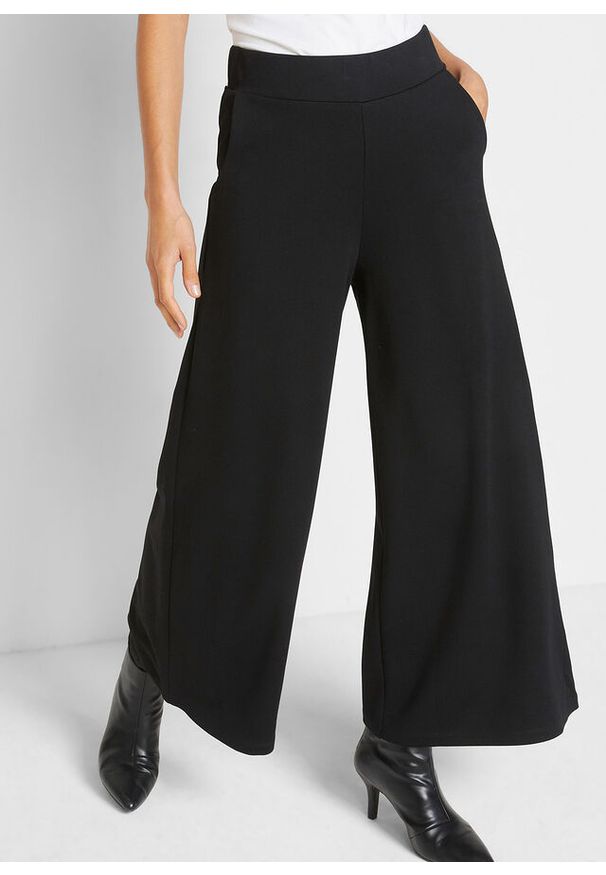 bonprix - Spodnie dresowe culotte Punto di Roma. Kolor: czarny. Materiał: dresówka. Styl: elegancki
