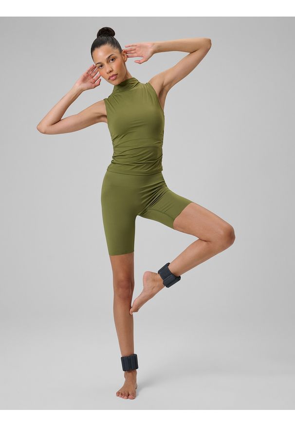 4f - 4F Legginsy kolarki do jogi damskie - oliwkowe M. Stan: podwyższony. Kolor: oliwkowy, brązowy, wielokolorowy. Materiał: włókno, skóra. Długość: długie. Wzór: gładki. Sport: joga i pilates