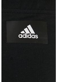 Adidas - adidas legginsy damskie kolor czarny z nadrukiem. Kolor: czarny. Materiał: materiał. Wzór: nadruk #2