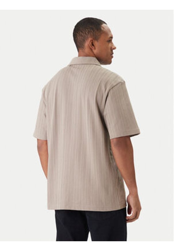 Hugo - HUGO Polo Dalibo 50556724 Beżowy Relaxed Fit. Typ kołnierza: polo. Kolor: beżowy. Materiał: bawełna