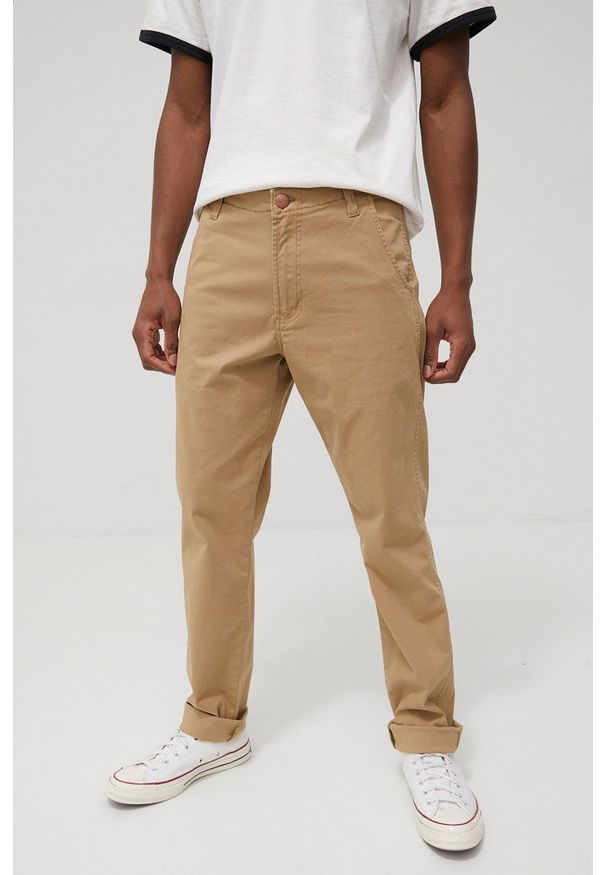 Wrangler spodnie męskie kolor beżowy w fasonie chinos. Kolor: beżowy. Materiał: tkanina