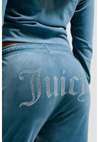 Juicy Couture - JUICY COUTURE Niebieskie damskie spodnie dresowe Tina Trackpants, Rozmiar S. Kolor: niebieski. Materiał: dresówka