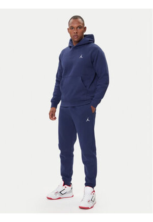 Nike Spodnie dresowe FV7277 410 Granatowy Regular Fit. Kolor: niebieski. Materiał: bawełna