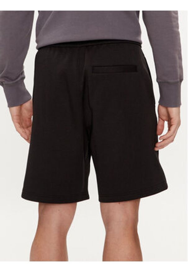 Calvin Klein Jeans Szorty sportowe Logo Repeat J30J325129 Czarny Regular Fit. Kolor: czarny. Materiał: syntetyk. Styl: sportowy