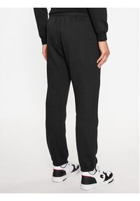 Champion Spodnie dresowe Elastic Cuff Pants 219420 Czarny Comfort Fit. Kolor: czarny. Materiał: dresówka, bawełna