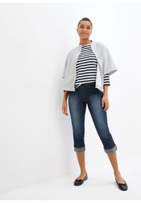 bonprix - Dżinsy o kroju slim fit, ze stanem mid waist, uszyte z bawełny. Kolor: niebieski