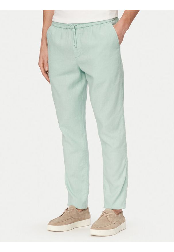 TOMMY HILFIGER - Tommy Hilfiger Chinosy Harlem MW0MW42336 Zielony jasny Regular Fit. Kolor: zielony. Materiał: len