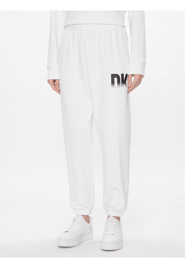 DKNY Sport Spodnie dresowe DP3P3379 Biały Relaxed Fit. Kolor: biały. Materiał: syntetyk