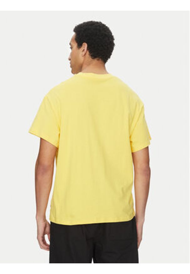 Puma T-Shirt Dylan's World 630257 Żółty Regular Fit. Kolor: żółty. Materiał: bawełna