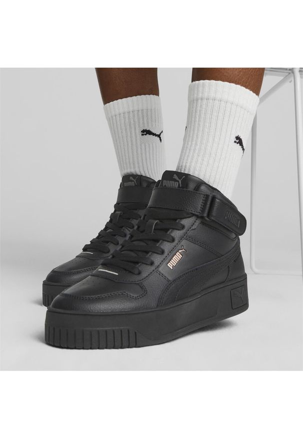 Puma - Damskie sneakersy Carina Street Mid PUMA Black Rose Gold Metallic. Kolor: wielokolorowy, szary, żółty, czarny. Materiał: skóra, materiał, syntetyk, tkanina, guma. Sezon: lato. Sport: turystyka piesza