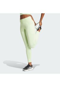 Adidas - Legginsy DailyRun 7/8. Kolor: zielony. Wzór: gładki