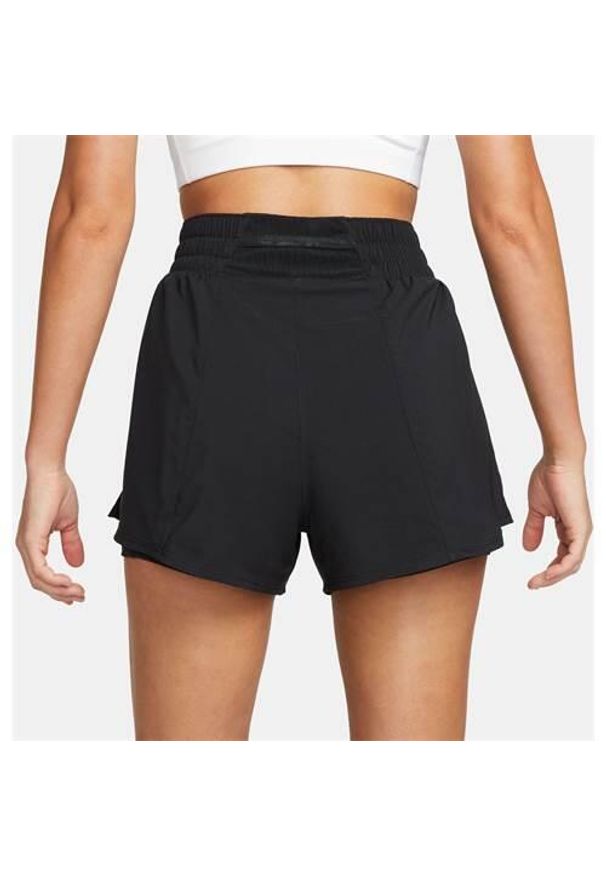 Spodnie treningowe damskie Nike DX6016. Kolor: czarny. Materiał: syntetyk, materiał. Długość: krótkie