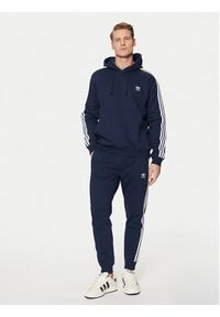 Adidas - adidas Spodnie dresowe adicolor 3-Stripes IM9319 Granatowy Slim Fit. Kolor: niebieski. Materiał: bawełna, syntetyk #2