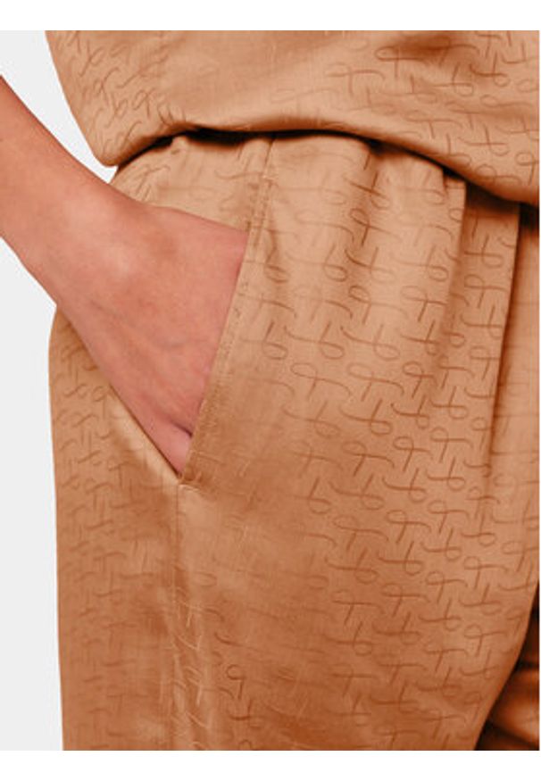 Triumph Spodnie piżamowe Silky Sensuality 10218287 Brązowy Relaxed Fit. Kolor: brązowy. Materiał: lyocell