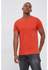 Superdry T-shirt bawełniany kolor pomarańczowy z aplikacją. Okazja: na co dzień. Kolor: pomarańczowy. Materiał: bawełna. Wzór: aplikacja. Styl: casual