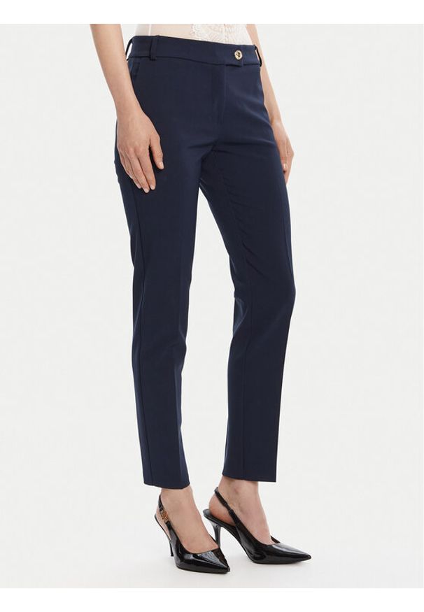 Rinascimento Chinosy CFC0126225003 Granatowy Slim Fit. Kolor: niebieski. Materiał: syntetyk
