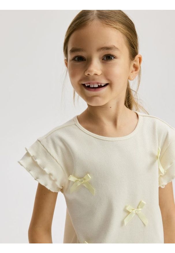 Reserved - Bluzka z kokardkami - jasnożółty. Typ kołnierza: kokarda. Kolor: żółty. Materiał: bawełna