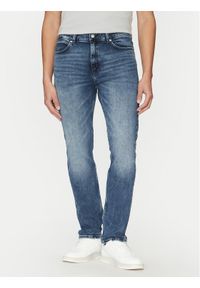 Hugo - HUGO Jeansy 50530587 Niebieski Slim Fit. Kolor: niebieski