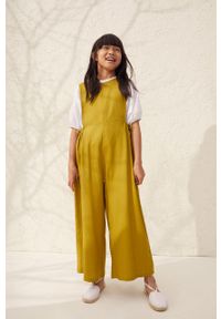 Mango Kids - Kombinezon dziecięcy Ella 128-164 cm. Kolor: żółty. Materiał: tkanina, wiskoza. Długość rękawa: bez rękawów. Długość: długie. Wzór: gładki #1