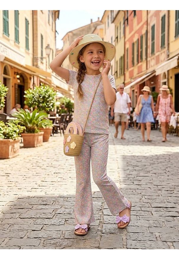 Sinsay - Bawełniane legginsy flare z motywem kwiatowym - wielobarwny. Materiał: bawełna. Wzór: kwiaty