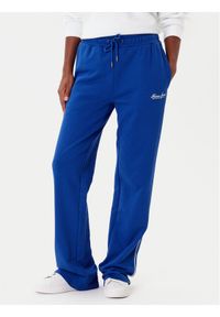 Guess Jeans Spodnie dresowe W5YB32 K68I4 Niebieski Regular Fit. Kolor: niebieski. Materiał: bawełna
