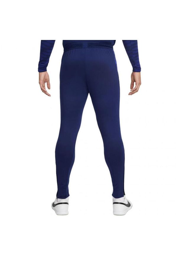 Nike - Męskie Spodnie Dresowe Strike 21 DriFIT. Kolor: niebieski. Materiał: dresówka
