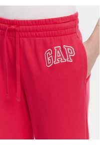 GAP - Gap Spodnie dresowe 889527-04 Różowy Relaxed Fit. Kolor: różowy. Materiał: bawełna